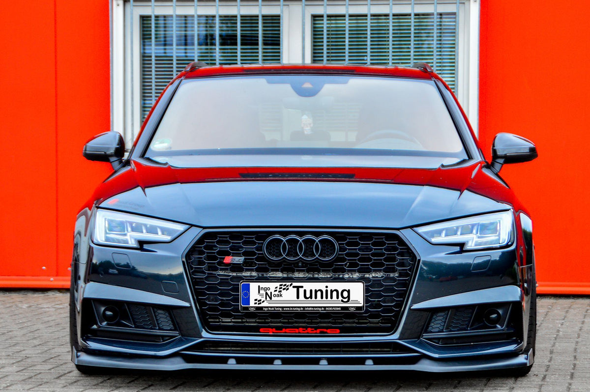 Frontspoilerlippe V2 mit Wings für Audi A4 S-Line und S4 B9, schwarzes Tuning-Accessory, sichtbar an der Fahrzeugfront