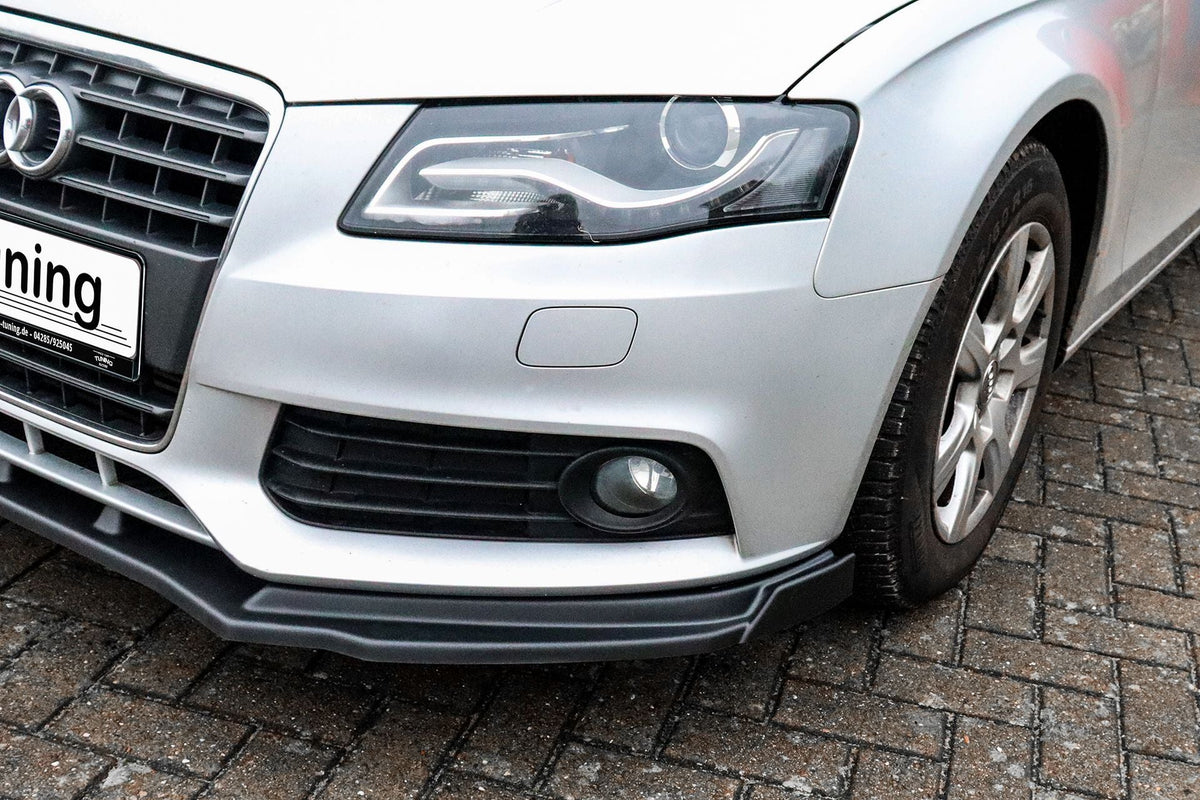 Frontspoilerlippe mit Wings für Audi A4 B8 S-Line von Ingo Noak Tuning, schwarze Kunststoffpartie mit aerodynamischem Design